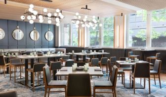 Dining area perfect for coworking at The Slate Denver, Tapestry Collection By Hilton.