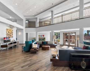 Lobby and coworking lounge at Hampton Inn & Suites Phoenix/Gilbert.