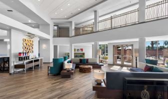 Lobby and coworking lounge at Hampton Inn & Suites Phoenix/Gilbert.