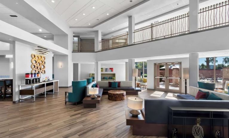 Lobby and coworking lounge at Hampton Inn & Suites Phoenix/Gilbert.