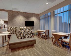 Lobby and coworking lounge at Hampton Inn & Suites Sunnyvale Silicon Valley.