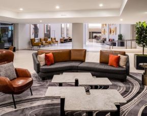 Lobby and coworking lounge at Hilton Dallas Lincoln Centre.