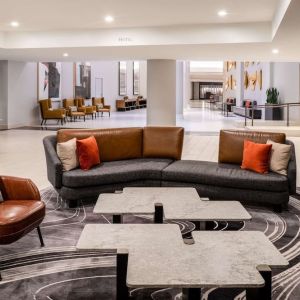 Lobby and coworking lounge at Hilton Dallas Lincoln Centre.