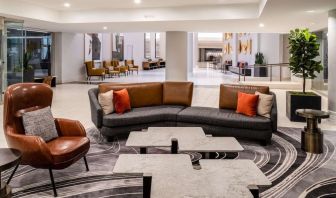 Lobby and coworking lounge at Hilton Dallas Lincoln Centre.