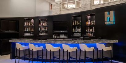 Hotel bar at Hilton Dallas Lincoln Centre.