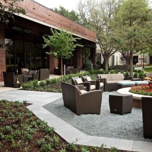 Firepit surrounded by outdoor furniture at Hilton Anatole.