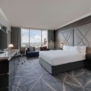 Day use room with work desk and sofa at Hilton Atlanta.