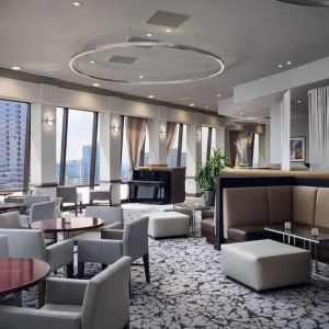 Dining area with natural light perfect for coworking at Hilton Atlanta.