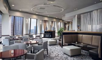 Dining area with natural light perfect for coworking at Hilton Atlanta.