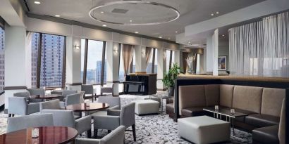 Dining area with natural light perfect for coworking at Hilton Atlanta.