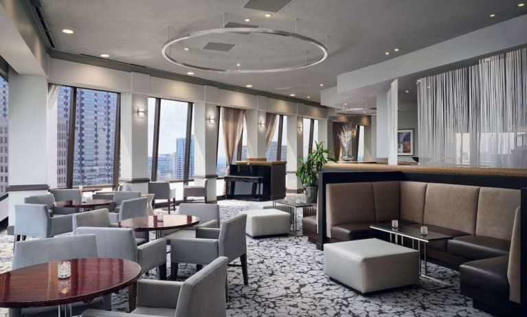 Dining area with natural light perfect for coworking at Hilton Atlanta.