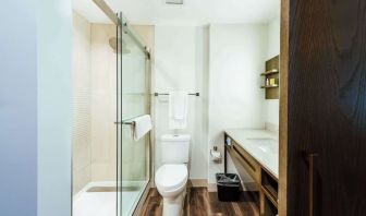 Guest bathroom with shower at Hilton Garden Inn Denver Union Station.