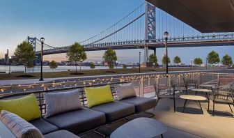 Outdoor furniture perfect for coworking at Hilton Garden Inn Camden Waterfront Philadelphia.