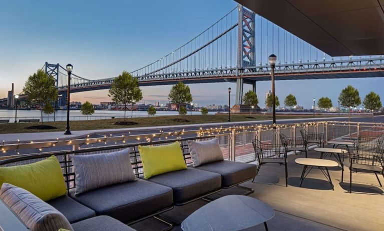 Outdoor furniture perfect for coworking at Hilton Garden Inn Camden Waterfront Philadelphia.