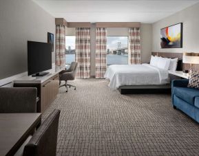 Spacious day use room with living area at Hilton Garden Inn Camden Waterfront Philadelphia.