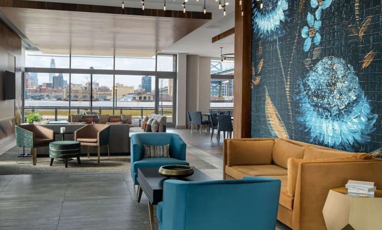 Lobby and coworking lounge at Hilton Garden Inn Camden Waterfront Philadelphia.