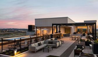 Hotel rooftop with lounge area and pool at Hilton BNA Nashville Airport Terminal.
