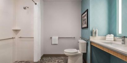 Private guest bathroom with shower at Hilton Garden Inn Nashville West End Avenue.