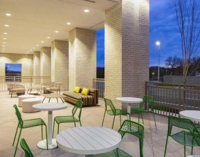 Outdoor seating area at Hilton Garden Inn Nashville West End Avenue.