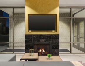 Lobby lounge with fireplace at Hilton Garden Inn Nashville West End Avenue.