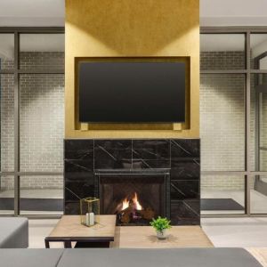 Lobby lounge with fireplace at Hilton Garden Inn Nashville West End Avenue.