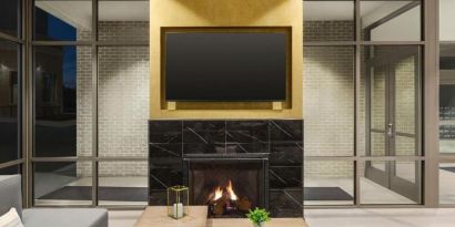 Lobby lounge with fireplace at Hilton Garden Inn Nashville West End Avenue.