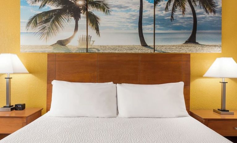 King bed at EnVision Hotel Miami International Airport.