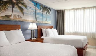 Bright and spacious day use twin room at EnVision Hotel Miami International Airport.