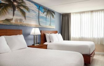 Bright and spacious day use twin room at EnVision Hotel Miami International Airport.