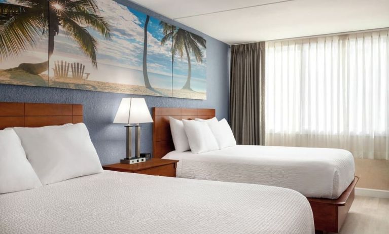 Bright and spacious day use twin room at EnVision Hotel Miami International Airport.