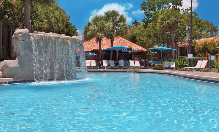 Waterfall in the lagoon pool of the DoubleTree By Hilton Orlando At SeaWorld.