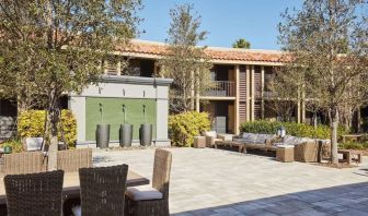 Garden with outdoor furniture at DoubleTree By Hilton Orlando At SeaWorld.