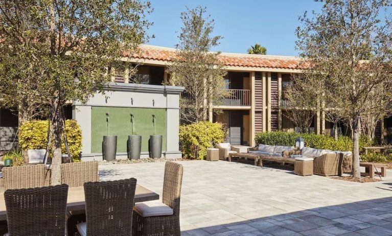 Garden with outdoor furniture at DoubleTree By Hilton Orlando At SeaWorld.