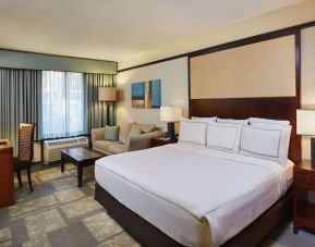 Day use room with sofa and work desk at DoubleTree By Hilton Orlando At SeaWorld.