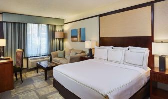 Day use room with sofa and work desk at DoubleTree By Hilton Orlando At SeaWorld.