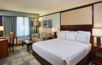 Day use room with sofa and work desk at DoubleTree By Hilton Orlando At SeaWorld.