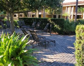 Loungers in the garden of DoubleTree By Hilton Orlando At SeaWorld.