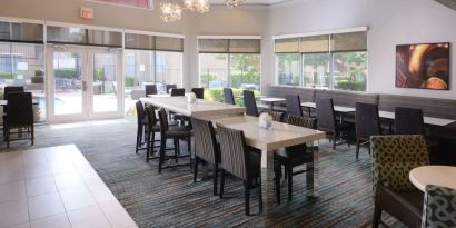 Dining area perfect for coworking at Sonesta ES Suites Dallas Medical Market Center.