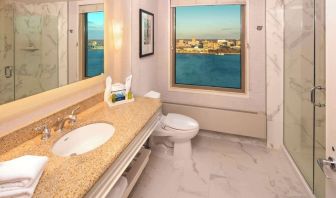 Guest bathroom with shower at Hilton Philadelphia At Penn's Landing.