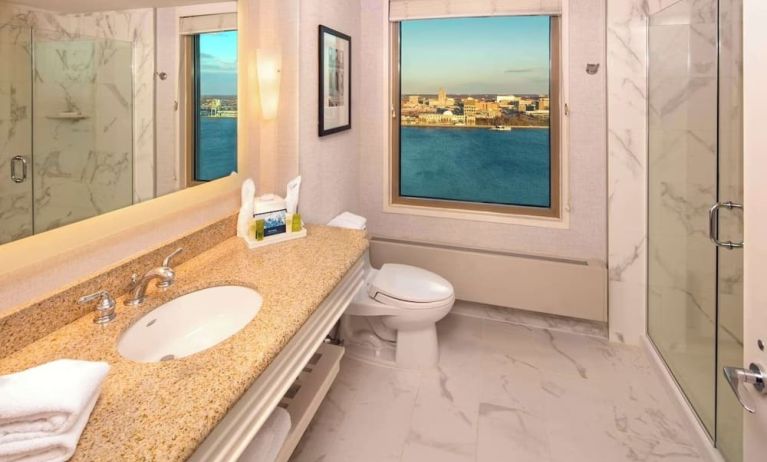 Guest bathroom with shower at Hilton Philadelphia At Penn's Landing.