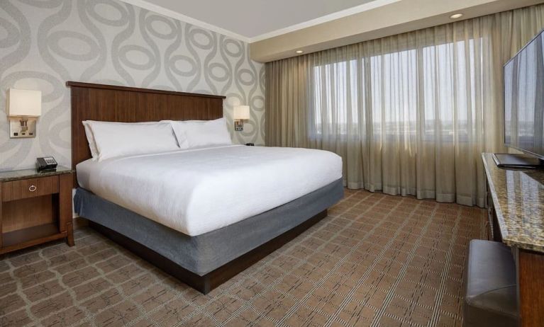 Comfortable king size bed at Embassy Suites By Hilton San Diego-La Jolla.