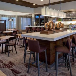 Dining area perfect for coworking at Sonesta Select Indianapolis Carmel.