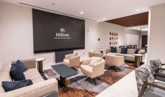 Lobby and coworking lounge at Hilton Crystal City At Washington Reagan National Airport.