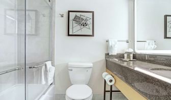 Guest bathroom with shower at Hilton Crystal City At Washington Reagan National Airport.