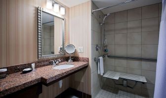 Private guest bathroom with shower at Sonesta Milwaukee West Wauwatosa.