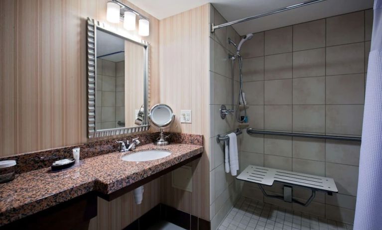 Private guest bathroom with shower at Sonesta Milwaukee West Wauwatosa.