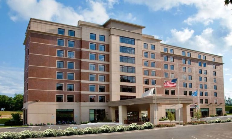 Hotel exterior and parking area at Sonesta Milwaukee West Wauwatosa.