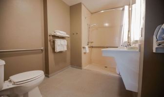 Private guest bathroom with shower at Sonesta ES Suites Dallas Las Colinas.