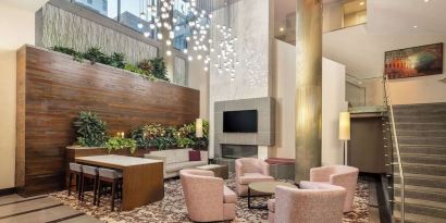 Lobby and coworking lounge at Hilton Garden Inn Washington DC/Georgetown Area.