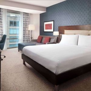 Day use room with work desk and sofa at Hilton Garden Inn Washington DC/Georgetown Area.